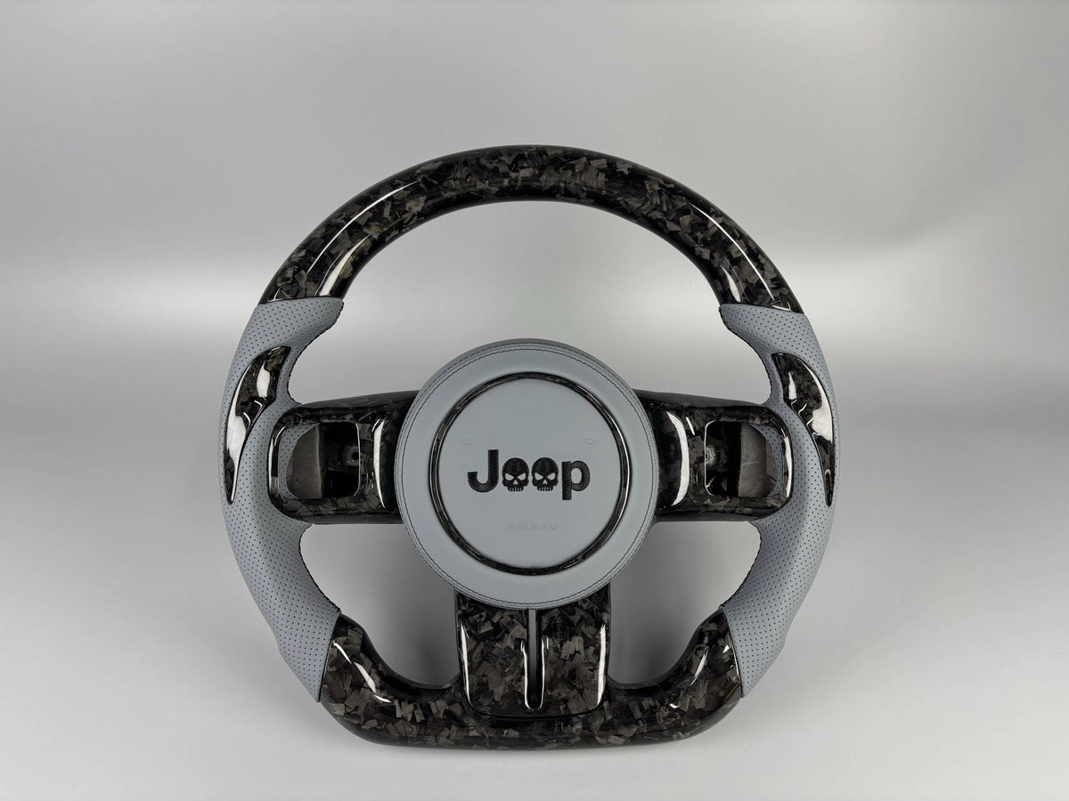 Forged carbon steering wheel with gray grips by MAB Customs